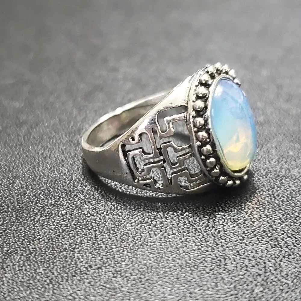 Silver tone ring with iridescent looking stone Size 10.75 - Picture 3 of 8